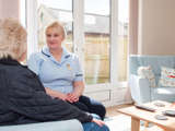 Elaine Kynaston - healthcare professional talking with patient