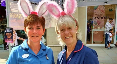 Two female nurses with bunny ears on Two female nurses with bunny ears on